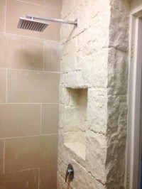kamień pod prysznicem